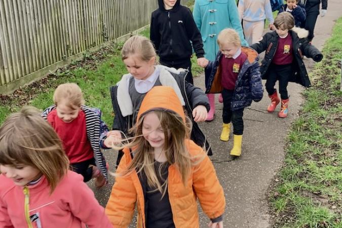 Artscapers walking happily and purposefully along the pavement 